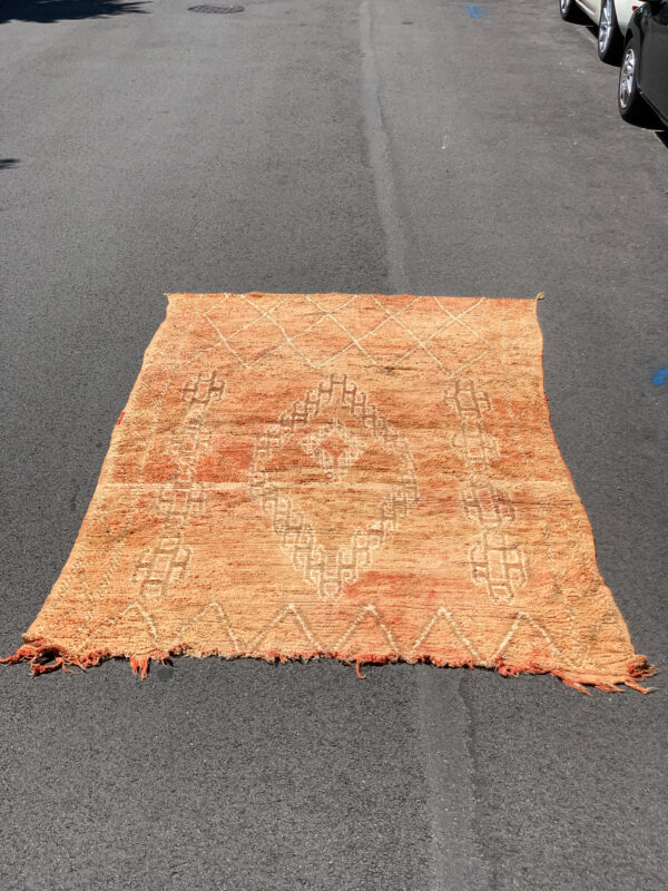 One of a kind, Vintage. Moroccan Boujaad rug from the 1970's. It was handwoven from pure organic wool by a Berber woman of the the Haouz region in the Middle Atlas. Terra Cotta Abstract Boujaad. 6’-6” x 9’-10”. SKU 142-15TE. $1950
