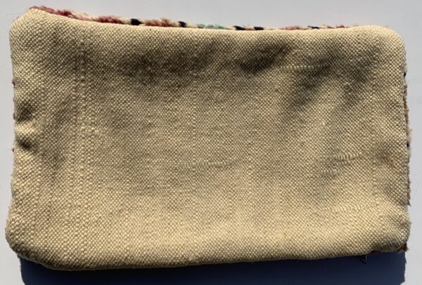 One of a kind. Moroccan pillow made from antique hand woven rugs, 2 sided pillow - plush wool on one side and flat wool on the opposite. 21" x 12.5". SKU 143-11. $95. Insert $50