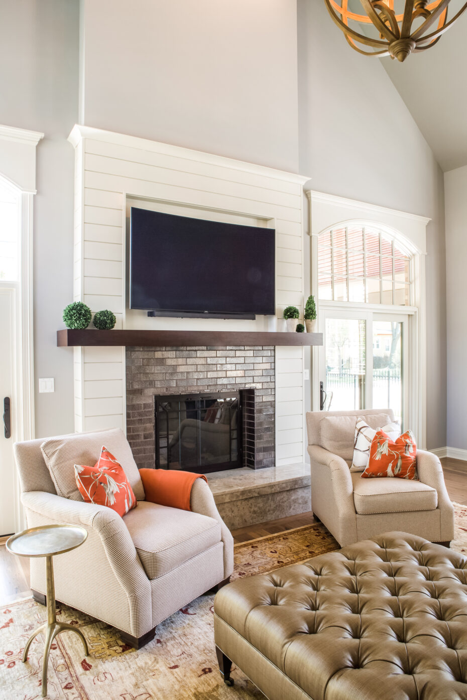fireplace with shiplap surround and glazed tile