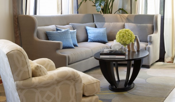 Living room with custom sectional in a Holly Hunt fabric and chair in an Osborne and Little fabric
